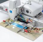 Dürkopp Adler 911-210-6020-10 CNC Kontrollü, Alternatif Klemp Sistemli, 600 x 200 mm Çalışma Alanlı Dikiş Otomatı