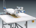Dürkopp Adler 911-210-8055-10 CNC Kontrollü, Geniş Alanlı – Alternatif Klemp Sistemli, 800 x 550 mm Çalışma Alanlı Dikiş Otomatı